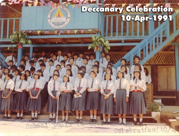 The School choir presenting a song “ Come Let us Build” during  school decadal Celebration on 10th April 1991.